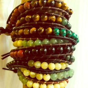 Single wrap red, gold & green bracelets